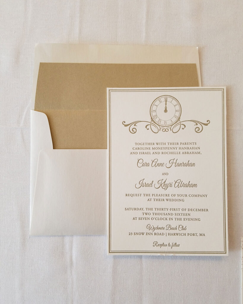 gold letterpress new years eve wedding invitation