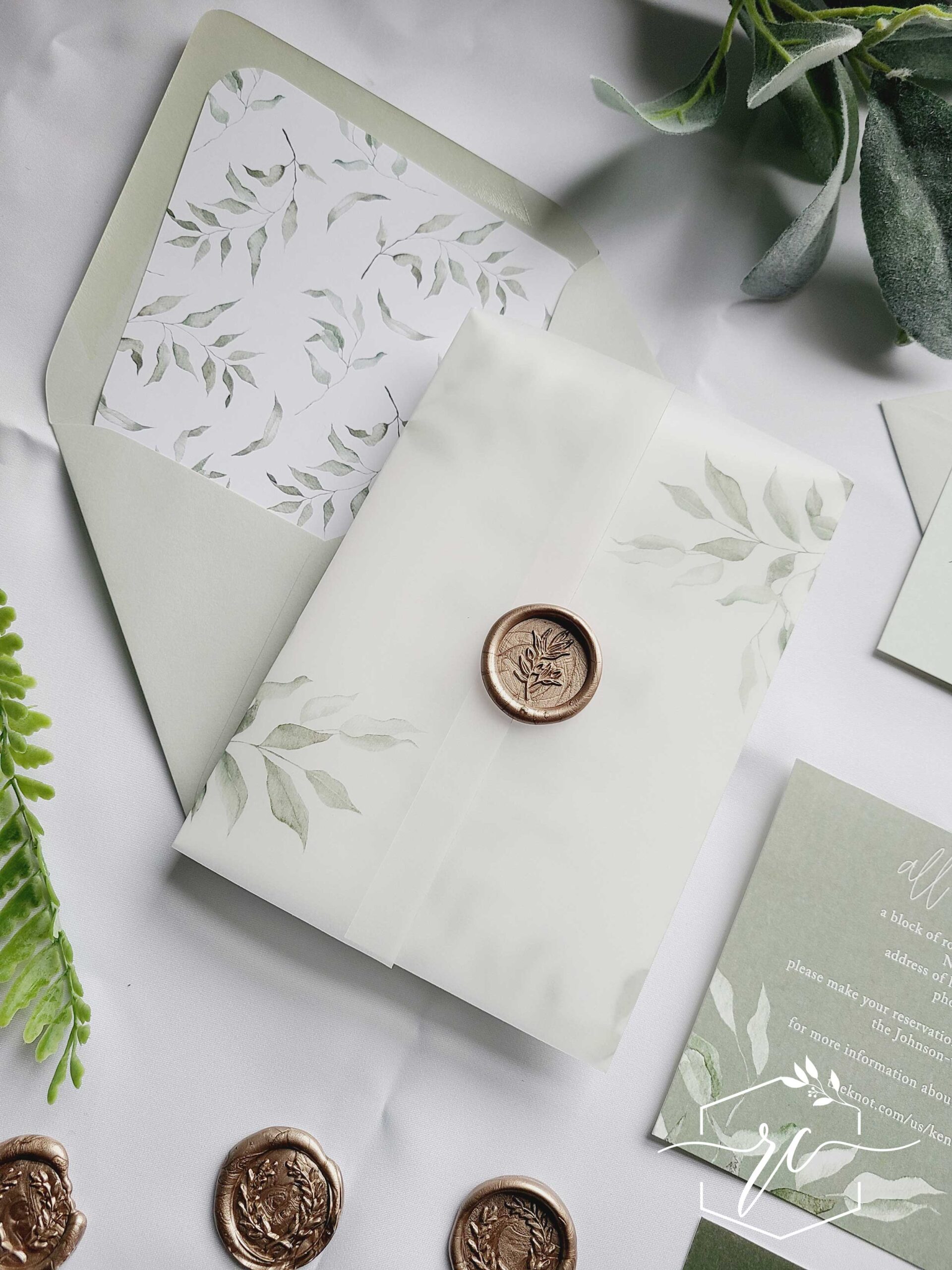 tender leaf vellum wedding invitation with wax seal