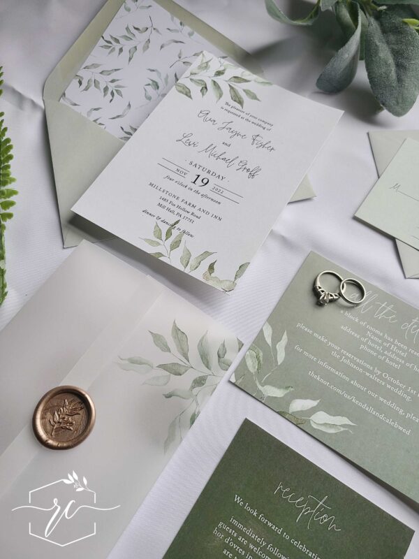 The Eva Wedding Invitation collection features soft sage greenery branches and shades of muted green for a layered fresh look