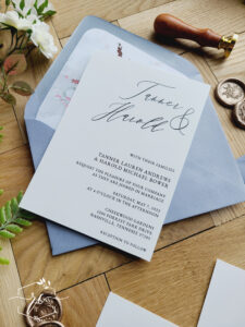 The Becca Wedding Invitation Suite featuring colorful wildflowers