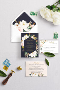 The Eleanor Wedding Invitation Suite - magnolia flowers with navy blue and gold