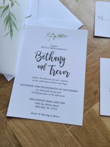 the kalilah wedding invitation suite - simple greenery wedding invitation with matching vellum jacket