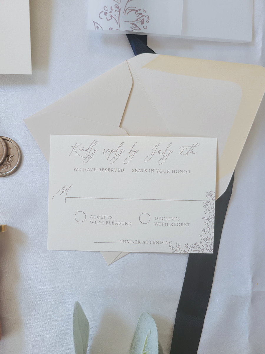 The Odette Wedding Invitation Suite with classic monogram crest and hand drawn flowers