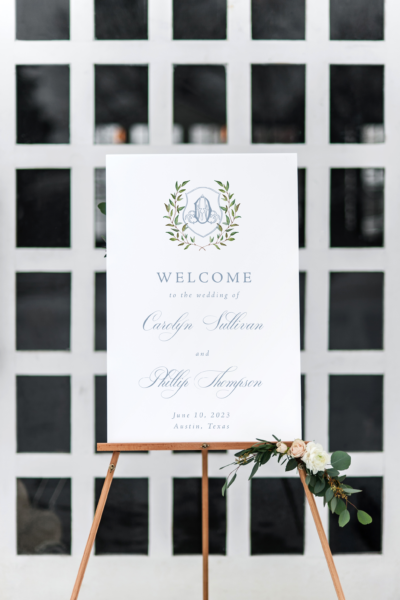 sibyl dusty blue monogram crest wedding welcome sign